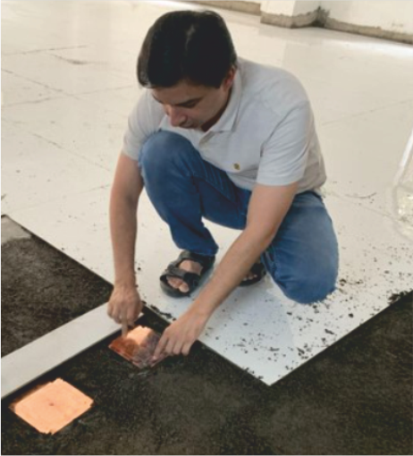 Acharya Upendra Ji placing energised yantras at accurate angles